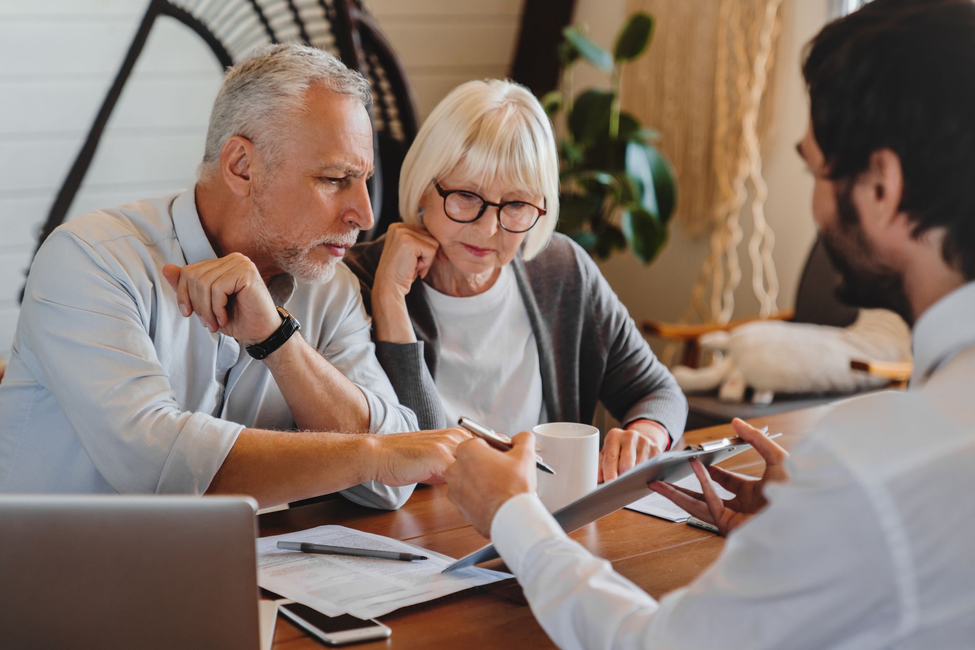 An Aetas Wealth adviser discussing financial planning with a client